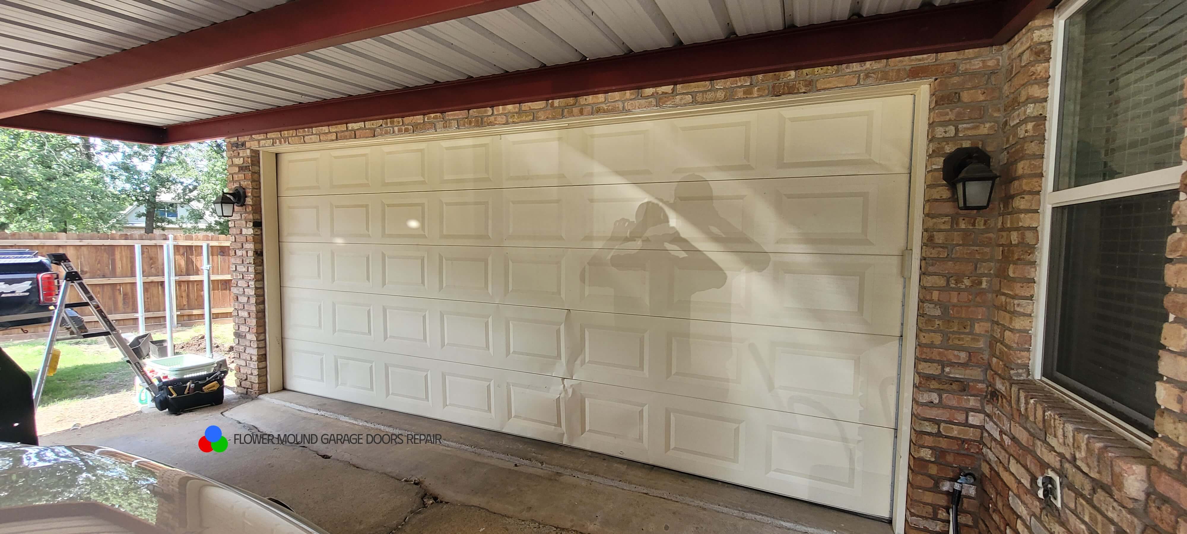 damgaged-garage-door-section